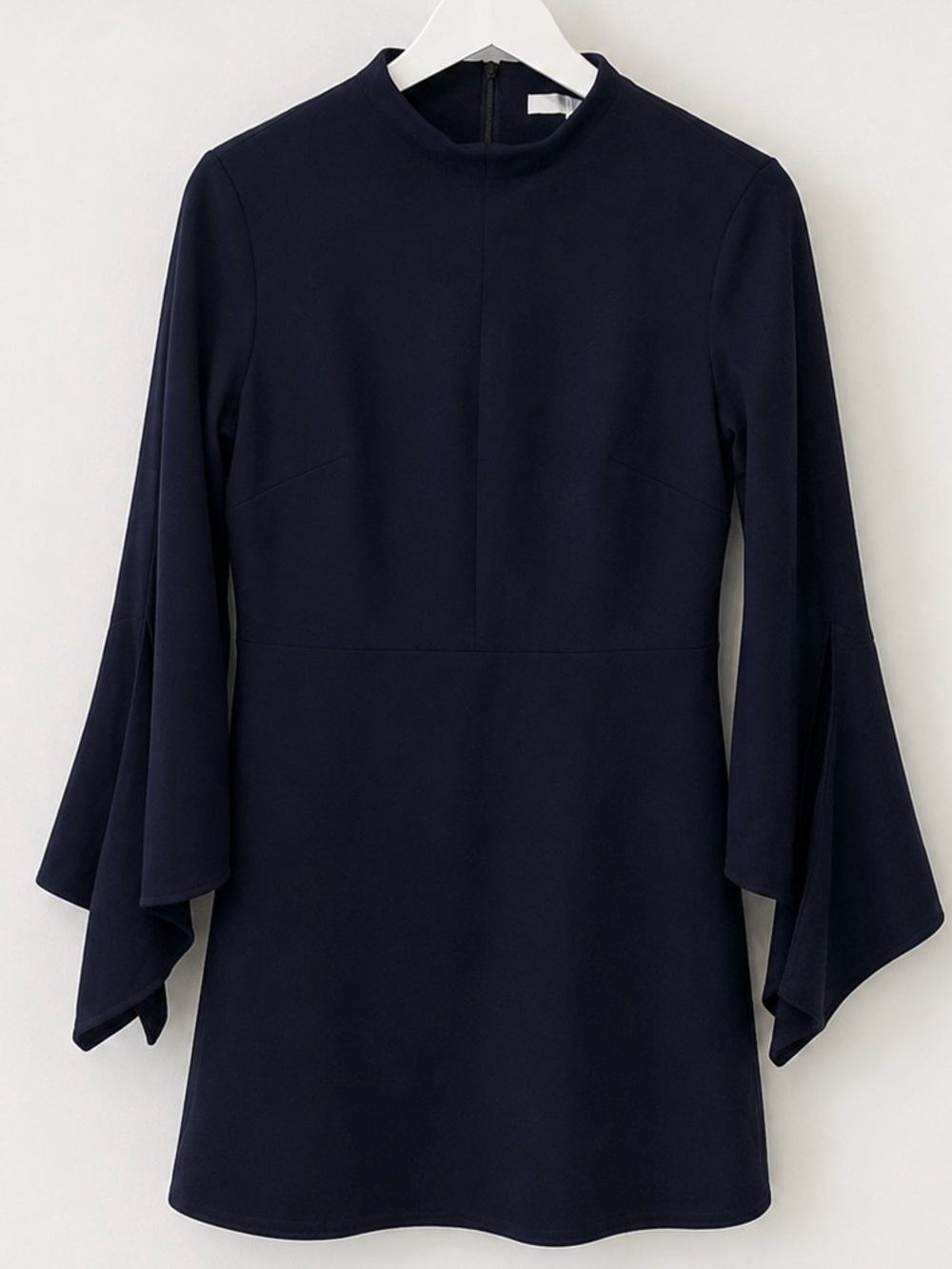 Tibi mock neck mini dress in navy blue, featuring long bell sleeves 4